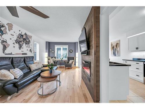 250 Fall Fair Way, Hamilton, ON - Indoor Photo Showing Living Room With Fireplace