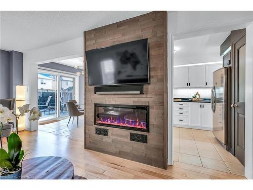 250 Fall Fair Way, Hamilton, ON - Indoor Photo Showing Living Room With Fireplace