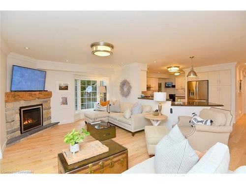 13-3333 New Street, Burlington, ON - Indoor Photo Showing Living Room With Fireplace