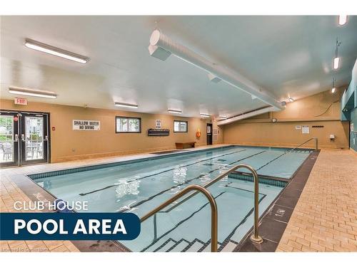 214 Silverbirch Boulevard, Mount Hope, ON - Indoor Photo Showing Other Room With In Ground Pool