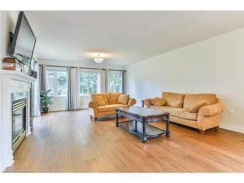 214 Silverbirch Boulevard, Mount Hope, ON - Indoor Photo Showing Living Room With Fireplace