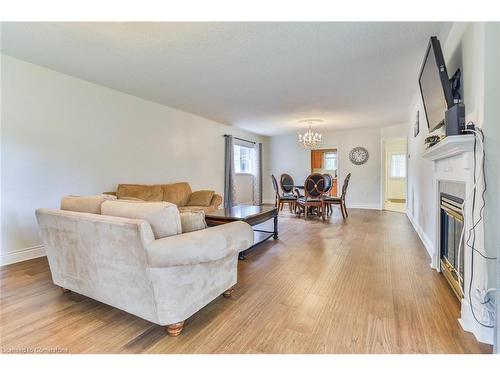 214 Silverbirch Boulevard, Mount Hope, ON - Indoor Photo Showing Living Room With Fireplace