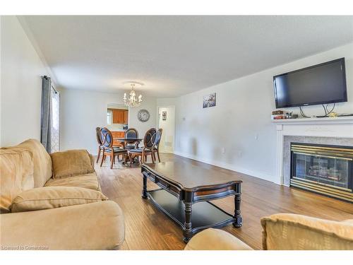 214 Silverbirch Boulevard, Mount Hope, ON - Indoor Photo Showing Living Room With Fireplace