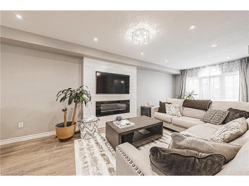 81 Mayland Trail, Stoney Creek, ON - Indoor Photo Showing Living Room With Fireplace