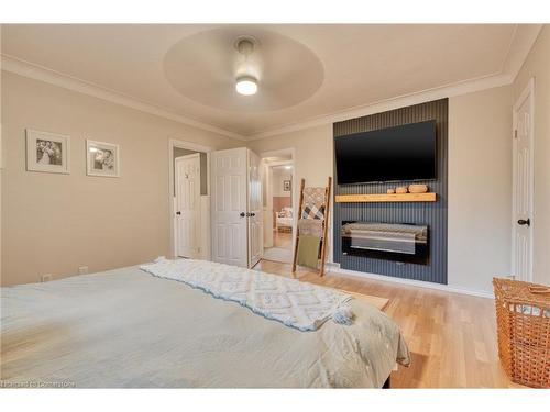 59 Felker Avenue, Hamilton, ON - Indoor Photo Showing Bedroom With Fireplace