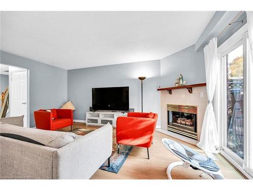 136 Essling Avenue, Hamilton, ON - Indoor Photo Showing Living Room With Fireplace