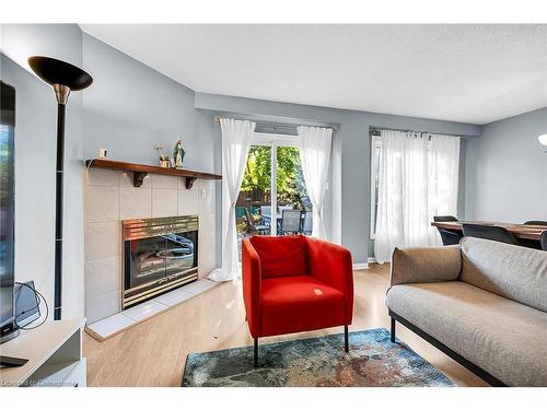 136 Essling Avenue, Hamilton, ON - Indoor Photo Showing Living Room With Fireplace