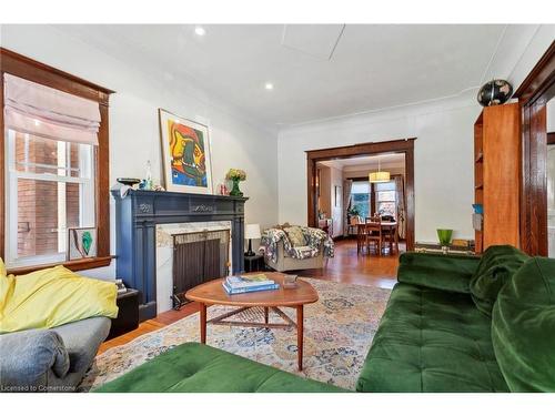 28 Hilda Avenue, Hamilton, ON - Indoor Photo Showing Living Room With Fireplace