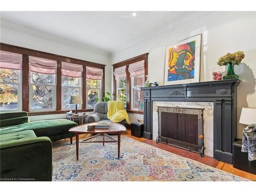 28 Hilda Avenue, Hamilton, ON - Indoor Photo Showing Living Room With Fireplace