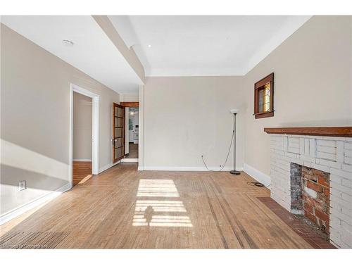 228 Duke Street, Hamilton, ON - Indoor Photo Showing Other Room With Fireplace