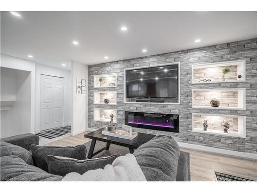 100 Boston Crescent, Hamilton, ON - Indoor Photo Showing Living Room With Fireplace