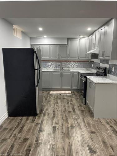 B-125 Lampman Drive, Grimsby, ON - Indoor Photo Showing Kitchen With Double Sink