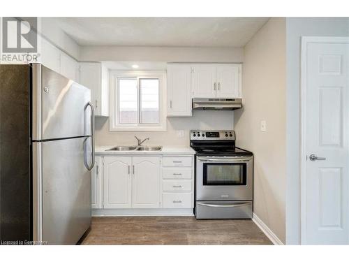 18 Agnes Street, Hamilton, ON - Indoor Photo Showing Kitchen With Double Sink