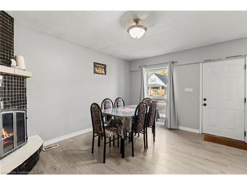 Main-81 East 23Rd Street, Hamilton, ON - Indoor Photo Showing Dining Room With Fireplace