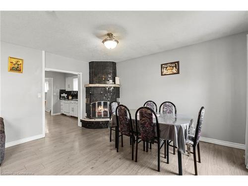 Main-81 East 23Rd Street, Hamilton, ON - Indoor Photo Showing Dining Room With Fireplace