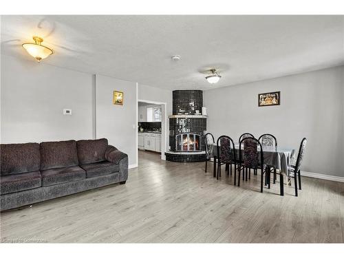 Main-81 East 23Rd Street, Hamilton, ON - Indoor Photo Showing Living Room With Fireplace