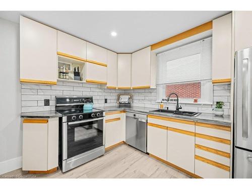 1108 Queensdale Avenue E, Hamilton, ON - Indoor Photo Showing Kitchen With Double Sink