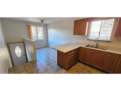 61 East 26Th Street, Hamilton, ON - Indoor Photo Showing Kitchen With Double Sink