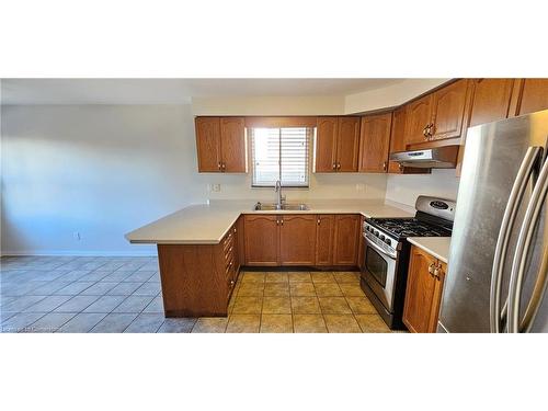 61 East 26Th Street, Hamilton, ON - Indoor Photo Showing Kitchen With Stainless Steel Kitchen With Double Sink