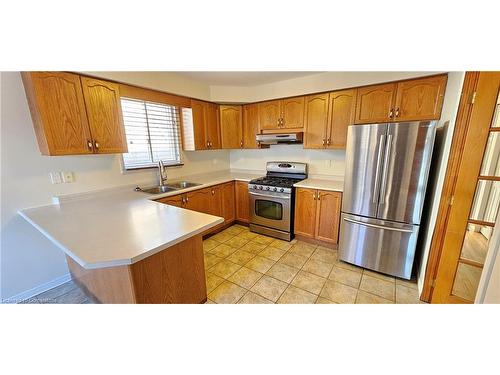 61 East 26Th Street, Hamilton, ON - Indoor Photo Showing Kitchen With Stainless Steel Kitchen With Double Sink