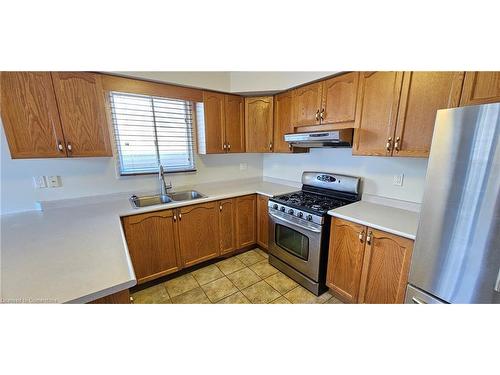 61 East 26Th Street, Hamilton, ON - Indoor Photo Showing Kitchen With Stainless Steel Kitchen With Double Sink