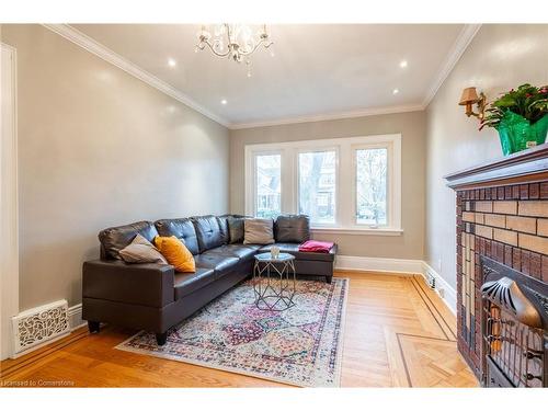 53 Tuxedo Avenue S, Hamilton, ON - Indoor Photo Showing Living Room With Fireplace