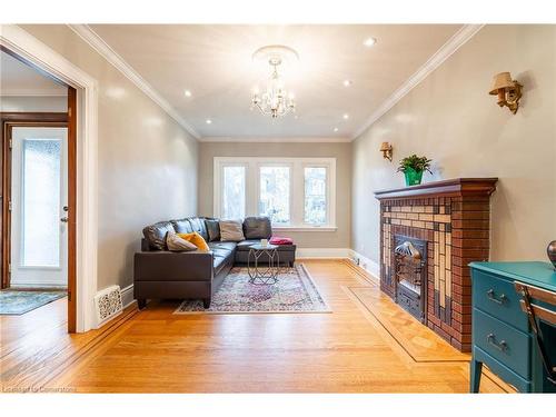 53 Tuxedo Avenue S, Hamilton, ON - Indoor Photo Showing Living Room With Fireplace