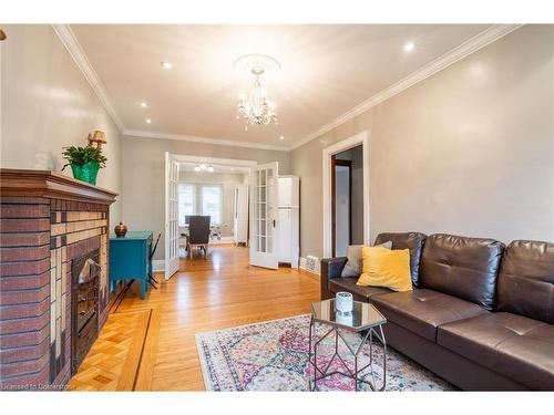 53 Tuxedo Avenue S, Hamilton, ON - Indoor Photo Showing Living Room With Fireplace