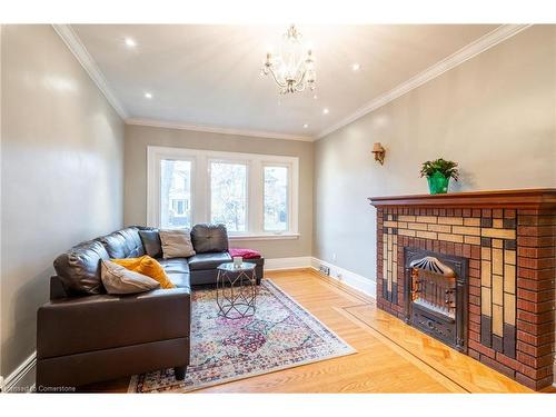 53 Tuxedo Avenue S, Hamilton, ON - Indoor Photo Showing Living Room With Fireplace