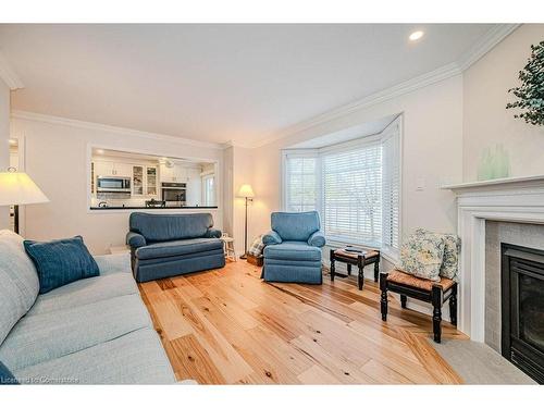 4-2145 Country Club Drive, Burlington, ON - Indoor Photo Showing Living Room With Fireplace