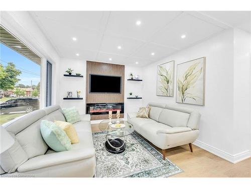 64 Viceroy Court, Hamilton, ON - Indoor Photo Showing Living Room With Fireplace