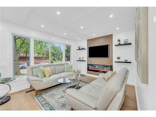 64 Viceroy Court, Hamilton, ON - Indoor Photo Showing Living Room With Fireplace