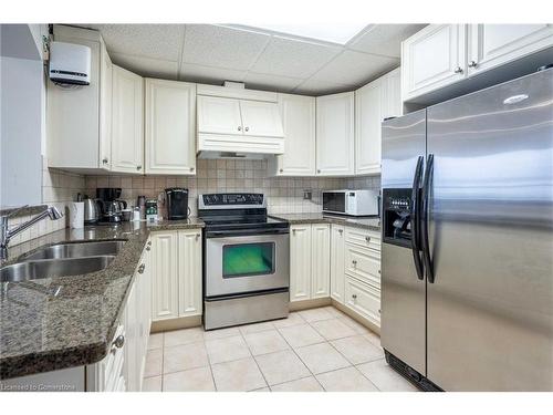 406-5340 Lakeshore Road, Burlington, ON - Indoor Photo Showing Kitchen With Double Sink