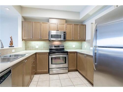 406-5340 Lakeshore Road, Burlington, ON - Indoor Photo Showing Kitchen With Double Sink