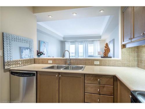 406-5340 Lakeshore Road, Burlington, ON - Indoor Photo Showing Kitchen With Double Sink