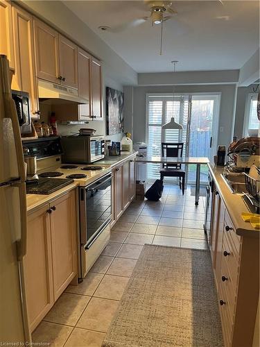 15 Southside Place, Hamilton, ON - Indoor Photo Showing Kitchen With Double Sink