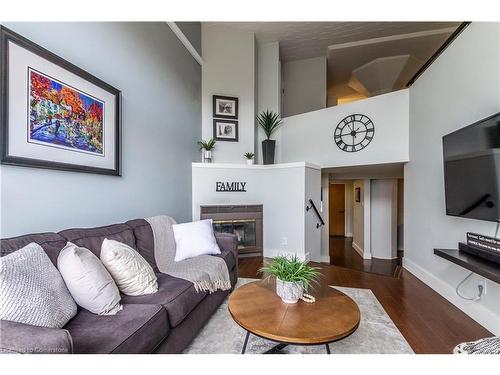 405-50 Main Street, Dundas, ON - Indoor Photo Showing Living Room With Fireplace