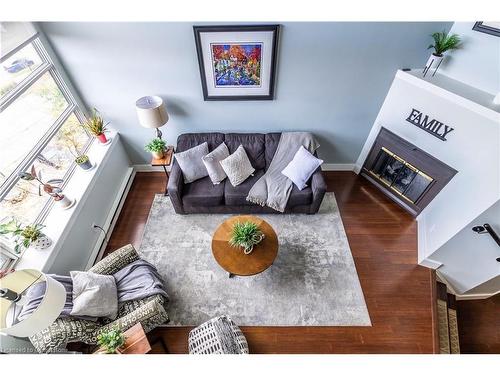 405-50 Main Street, Dundas, ON - Indoor Photo Showing Living Room With Fireplace