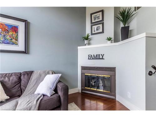 405-50 Main Street, Dundas, ON - Indoor Photo Showing Living Room With Fireplace