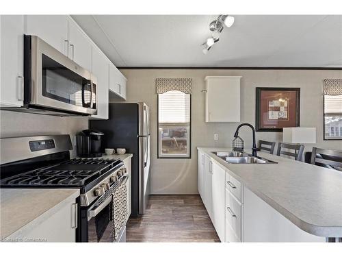 253-8845 Lundys Lane, Niagara Falls, ON - Indoor Photo Showing Kitchen With Double Sink