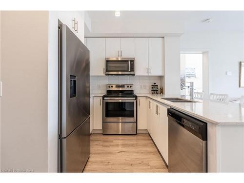 512-340 Plains Road, Burlington, ON - Indoor Photo Showing Kitchen With Double Sink With Upgraded Kitchen