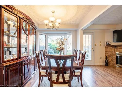 85 Royalvista Drive, Hamilton, ON - Indoor Photo Showing Dining Room With Fireplace