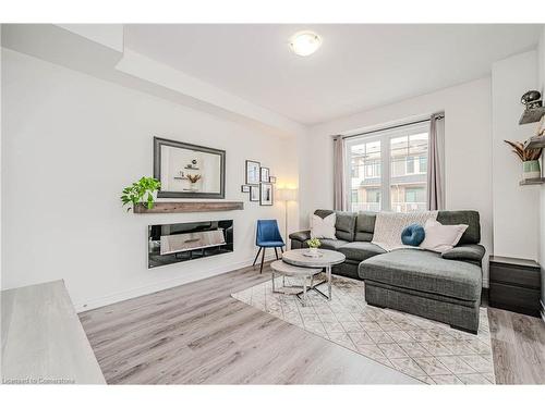 20-288 Glover Road, Stoney Creek, ON - Indoor Photo Showing Living Room With Fireplace