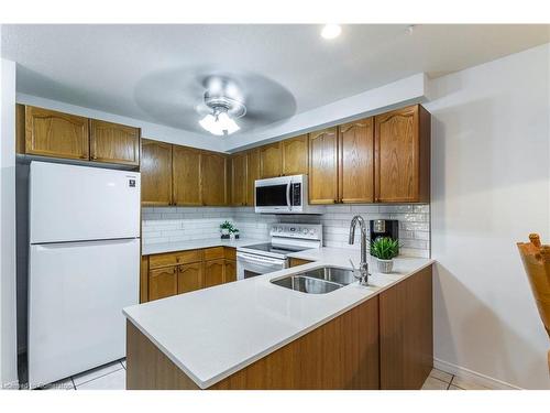 15 Trailbrook Lane, Guelph, ON - Indoor Photo Showing Kitchen With Double Sink