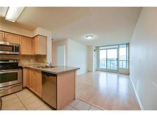 601-4850 Glen Erin Drive, Mississauga, ON - Indoor Photo Showing Kitchen With Double Sink