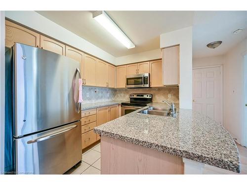 601-4850 Glen Erin Drive, Mississauga, ON - Indoor Photo Showing Kitchen With Double Sink