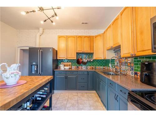 313 Mary Street, Hamilton, ON - Indoor Photo Showing Kitchen With Double Sink