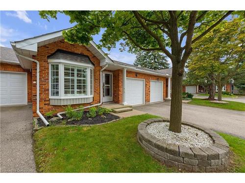 24-20 Meadowlands Boulevard, Ancaster, ON - Outdoor With Facade