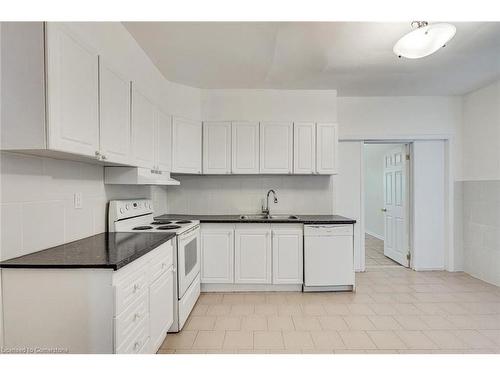 94 Wentworth Street N, Hamilton, ON - Indoor Photo Showing Kitchen With Double Sink