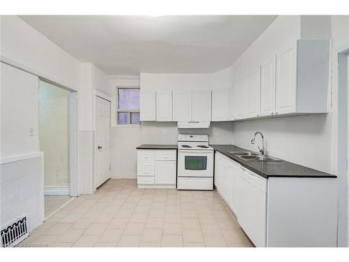 94 Wentworth Street N, Hamilton, ON - Indoor Photo Showing Kitchen With Double Sink